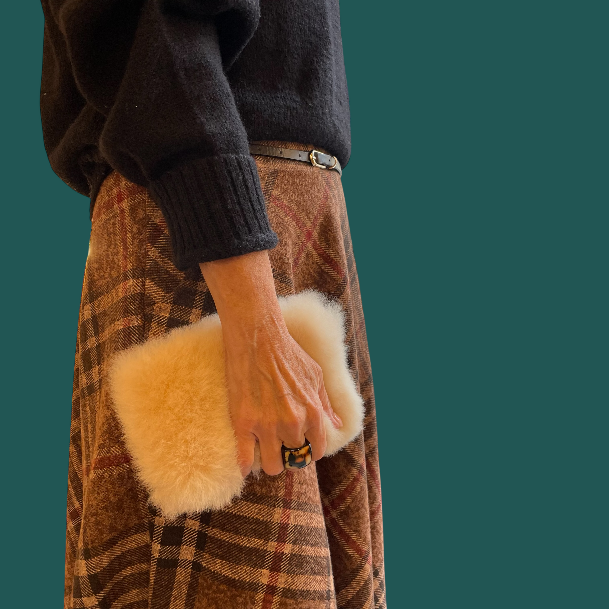 Pochette in pelo di alpaca beige artigianato peruviano lusso