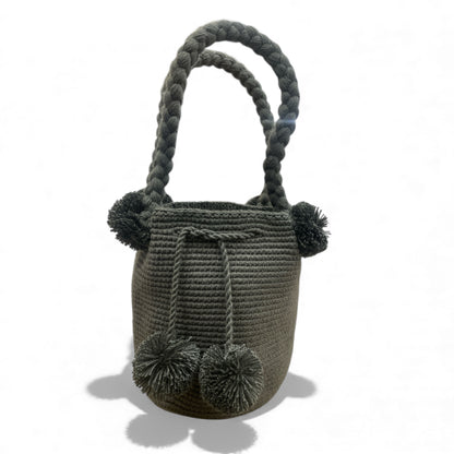 Mini mochila Wayuù beige oscuro con pompon decorativi borsa artigianale Colombia