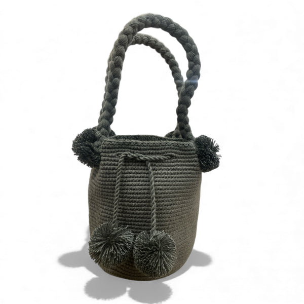 Mini mochila Wayuù beige oscuro con pompon decorativi borsa artigianale Colombia